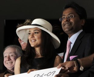 Lalit Modi and Preity Zinta present a cheque to the Alexander Sinton High School, Cape Town, 17 April 2009